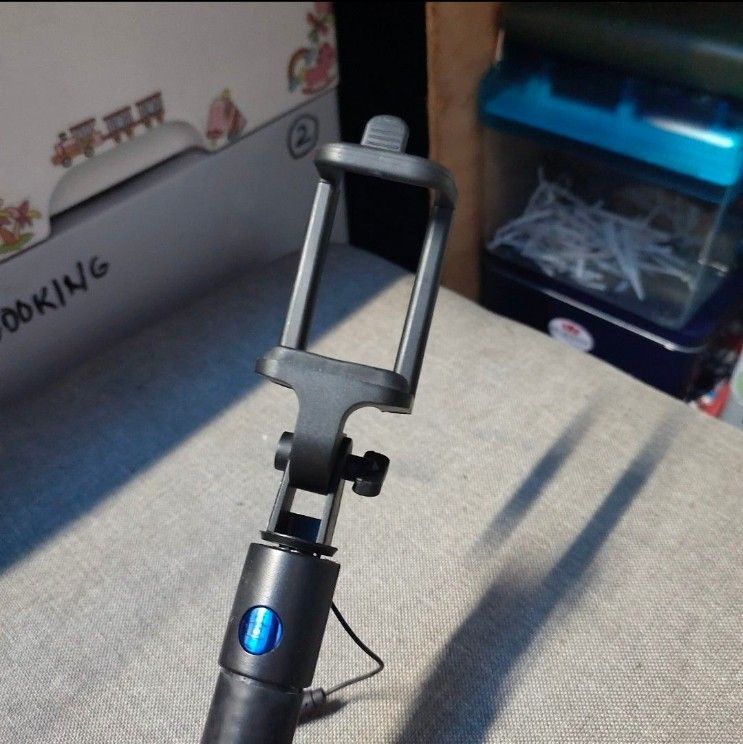Wired Selfie Stick Monopod with 3.5mm Jack (Category: Tripods & Monopods) located in Quezon City. Submitted by dncpreloved (Listing ID 1465490499, Image 2). Description: - Color: Black - Type: Handheld selfie stick monopod with foldable phone cradle - Portability: Compact and lightweight, fits easily into bags not sure if working pa ung remote. no way to test..