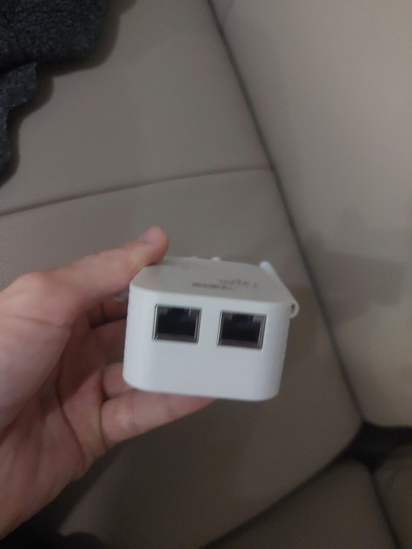 Wireless-N 4-Antenna WiFi Range Extender Repeater AP (Category: Networking) located in Manila. Submitted by fiercemountain_946e32 (Listing ID 1465508697, Image 2). Description: - Color: White - 4 adjustable external antennas for wide coverage - Eliminates WiFi dead zones at home - Direct wall plug design (US 2-prong) - Built-in LED status indicator lights - Default IP: 192.168.11.1 for easy setup.