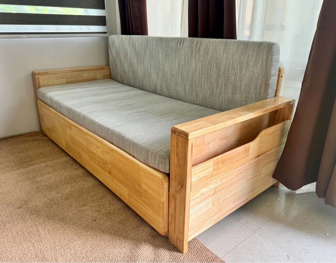 Wooden Sofa Sleeper Pull Out Bed Grey (Category: Sofas) located in Quezon City. Submitted by mgcw0lfe (Listing ID 1465528984, Image 3). Description: - 2-in-1 Design: Easily converts from a comfortable sofa into a spacious bed - Sturdy Build: Made with a durable solid wood frame and thick, supportive grey fabric cushions - Condition: Clean and well-maintained with no major issues - Ideal For: Space-saving living in condos, apartments, living rooms