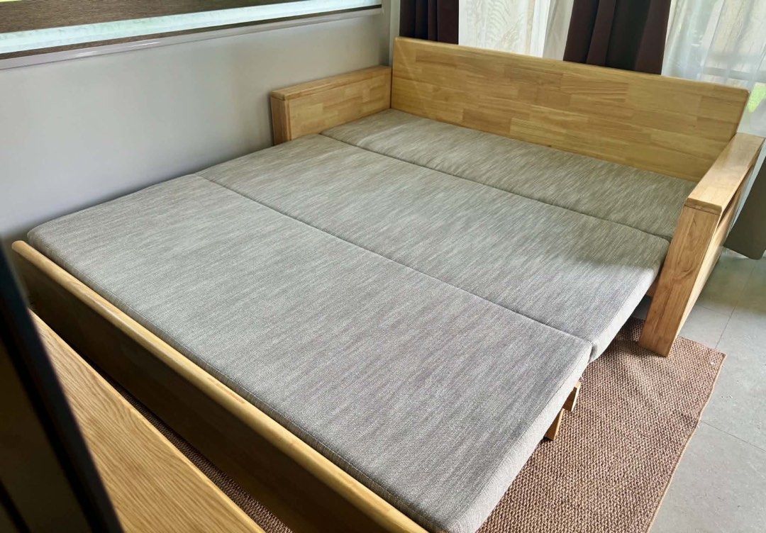 Wooden Sofa Sleeper Pull Out Bed Grey (Category: Sofas) located in Quezon City. Submitted by mgcw0lfe (Listing ID 1465528984, Image 2). Description: - 2-in-1 Design: Easily converts from a comfortable sofa into a spacious bed - Sturdy Build: Made with a durable solid wood frame and thick, supportive grey fabric cushions - Condition: Clean and well-maintained with no major issues - Ideal For: Space-saving living in condos, apartments, living rooms