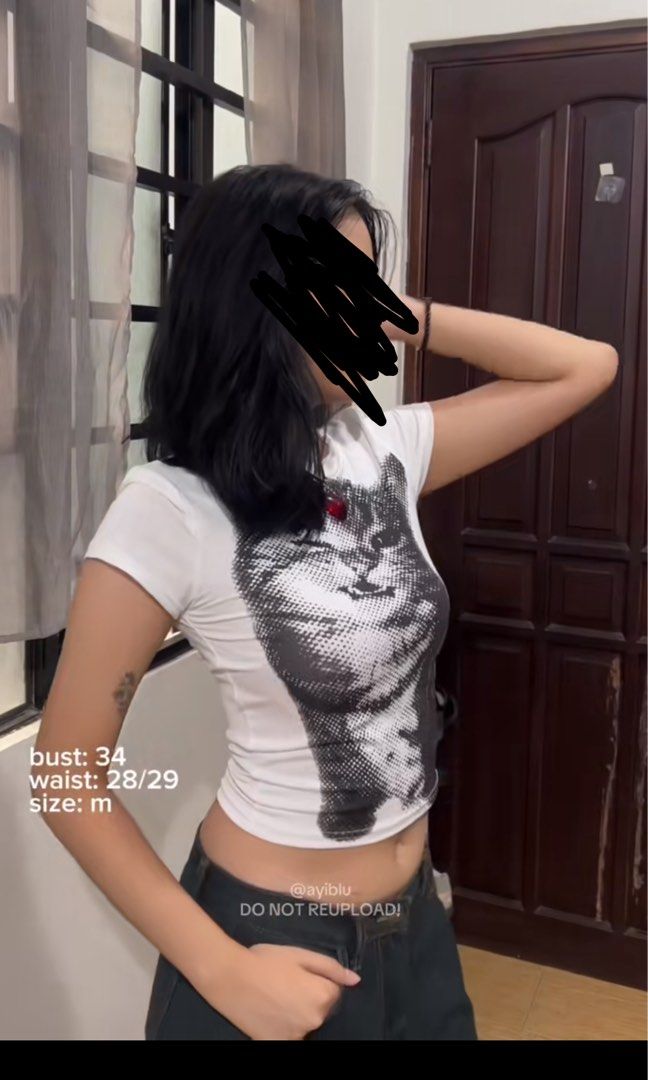y2k cat graphic baby tee croptop (Category: Shirts) located in Manila. Submitted by sophialeigh (Listing ID 1465485523, Image 2). Description: .