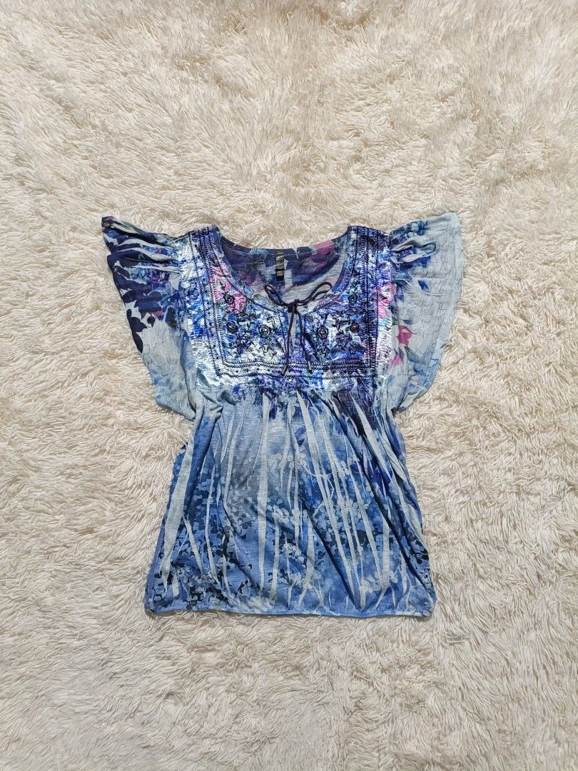 Y2K Floral Boho Flutter Sleeve (Category: Blouses) located in Minglanilla. Submitted by out.thrift (Listing ID 1465514577, Image 1). Description: 💠Y2K Blue Floral Boho Flutter Sleeve 📌Great Condition 📌Size L on tag 📌 Complete Tags 📌Need Wash 📍CEBU 📦 SHIP VIA J&T 👤 VISIT OUT THRIFT FOR LEGITIMACY AND PERMANENT VOUCH ❗ PLS MANAGE YOUR EXPECTATIONS SINCE THE ITEM IS THRIFTED.