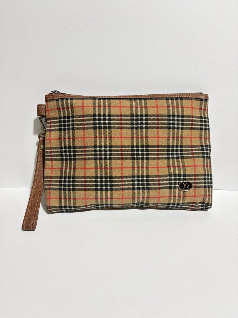 YC Checkered Clutch Bag (Category: Clutches) located in Quezon City. Submitted by wagwagan_ukay_blues (Listing ID 1465502076, Image 1). Description: From Japan In good condition ❗️stains inside not sure if washable L-9.5” W-1” H-6.5”.