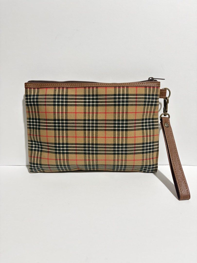 YC Checkered Clutch Bag (Category: Clutches) located in Quezon City. Submitted by wagwagan_ukay_blues (Listing ID 1465502076, Image 2). Description: From Japan In good condition ❗️stains inside not sure if washable L-9.5” W-1” H-6.5”.
