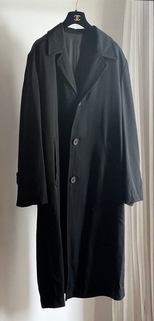 Yohji Yamamoto Fall 1997 trench coat (Category: Luxury Apparel) located in Quezon City. Submitted by raccoonfur (Listing ID 1465417094, Image 3). Description: Y’s for men by Yohji Yamamoto cocoon trench coat. Oversized for that murder of crows look. Has spot stains and moth holes on hem and left chest. Unnoticeable when worn. Amazing slouched drape and movement. For the collectors out there. Flat measurements: Pit to pit 67.5cm/26.5in Shoulders 4