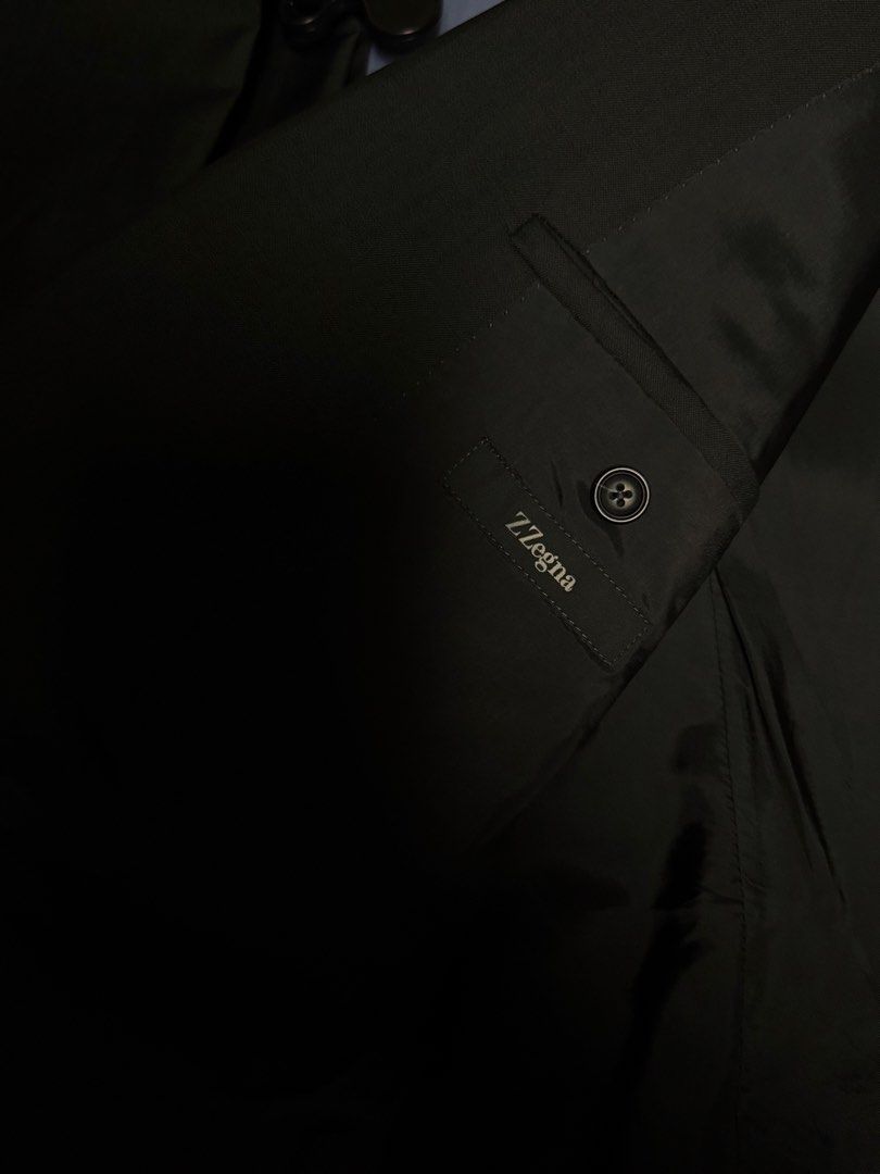 Zegna Black Suit Set Jacket and Trousers (Category: Coats, Jackets and Outerwear) located in Manila. Submitted by seangoart (Listing ID 1465474933, Image 2). Description: - Brand: Z Zegna - 50R 32 waist - Color: Charcoal Grey - Set includes: Matching jacket and trousers - Design: Two-button front closure, notch lapels, flap pockets, lined interior - Origin: Made in Mexico - Condition: Clean fabric with great overall structure - Versatility: Ideal