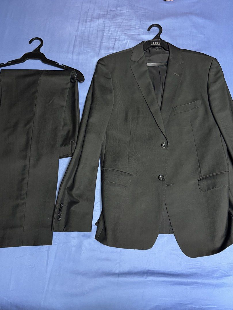 Zegna Black Suit Set Jacket and Trousers (Category: Coats, Jackets and Outerwear) located in Manila. Submitted by seangoart (Listing ID 1465474933, Image 1). Description: - Brand: Z Zegna - 50R 32 waist - Color: Charcoal Grey - Set includes: Matching jacket and trousers - Design: Two-button front closure, notch lapels, flap pockets, lined interior - Origin: Made in Mexico - Condition: Clean fabric with great overall structure - Versatility: Ideal