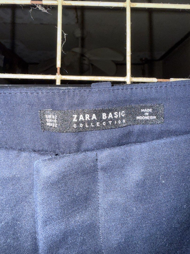 Zara Basic Collection Navy Blue Pants Size EUR 42 (Category: Other Bottoms) located in Quezon City. Submitted by nsseller (Listing ID 1465504653, Image 2). Description: - Brand: Zara Basic Collection - Color: Navy Blue - Size: EUR 42, USA 10, MEX 32 (Standard sizing) - Style: Mid-rise waist with standard pockets - Origin: Made in Indonesia - Condition/Use: Clean design, ideal for office wear or smart casual outings.