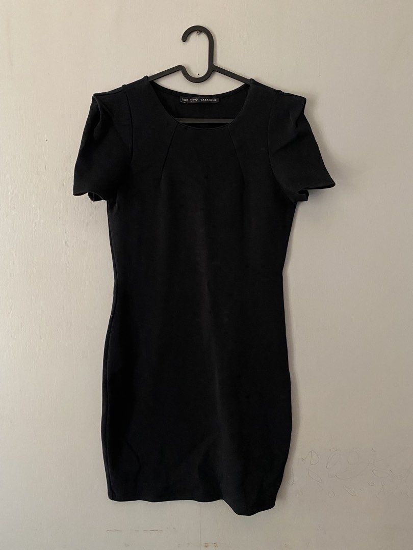 ZARA BASIC Little Black Dress - Bodycon - Size M (Category: Dresses) located in Bulacan. Submitted by knklittlecloset (Listing ID 1465509993, Image 1). Description: Brand: ZARA BASIC (authentic) Size: Medium on tag Color: Black Cut: Bodycon / fitted, knee-length Neckline: Scoop / round neck Sleeve: Short cap sleeves with structured shoulder detail - super flattering! Measurements (laid flat): Bust: ∼16-17 inches Waist: ∼14-15 inches Length: ∼34-3