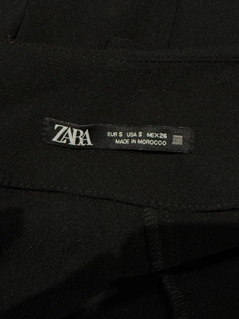 Zara Black Blazer Dress Size S (Category: Dresses) located in Quezon City. Submitted by nsseller (Listing ID 1465506563, Image 2). Description: - Brand: Zara - Size: S (Made in Morocco) - Color: Solid Black - Style: V-neck wrap front, two-button waist, long sleeves, flared skirt - Condition: Excellent - Versatile piece: Great for work, events, or casual outings - Easy to pair with heels or boots.