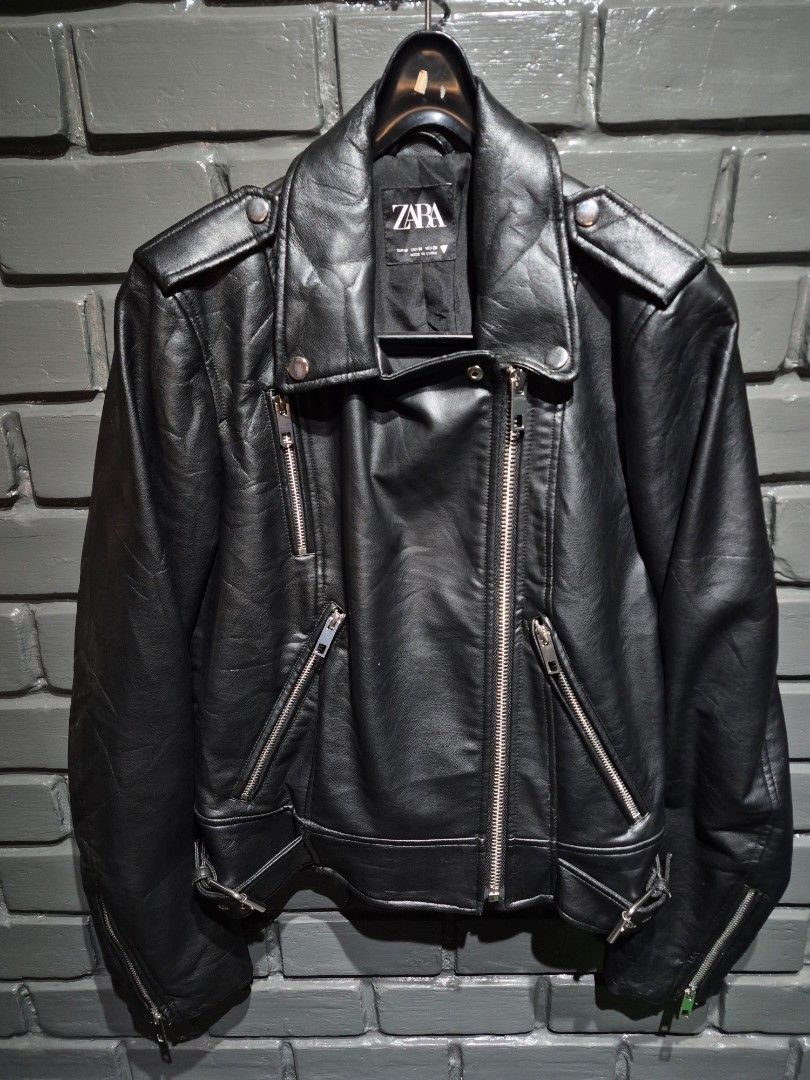 ZARA Black Faux Leather Biker Jacket (Category: Coats, Jackets and Outerwear) located in Davao. Submitted by rodrigoani57168 (Listing ID 1465424022, Image 3). Description: - Brand/Item: Zara black faux leather biker jacket - Size: M (Width: 19", Length: 22") - Hardware: Silver-tone with smooth, heavy-duty zippers - Features: Asymmetric front zip, chest and side pockets, zipped cuffs, and adjustable waist belts - Condition: Great staple piece for 