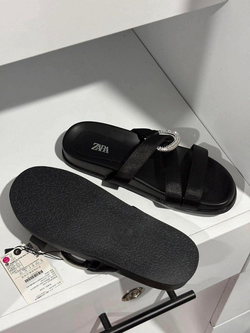 ZARA Black Rhinestone Buckle Flat Sandals (Category: Flats & Sandals) located in Mandaluyong City. Submitted by bayline999 (Listing ID 1465400166, Image 3). Description: SIZES 35 36 38 39 WITH BOX AND PAPERBAG .