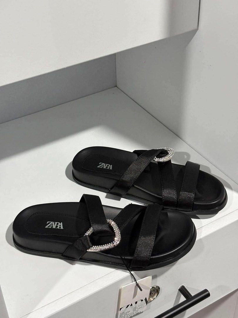 ZARA Black Rhinestone Buckle Flat Sandals (Category: Flats & Sandals) located in Mandaluyong City. Submitted by bayline999 (Listing ID 1465400166, Image 1). Description: SIZES 35 36 38 39 WITH BOX AND PAPERBAG .