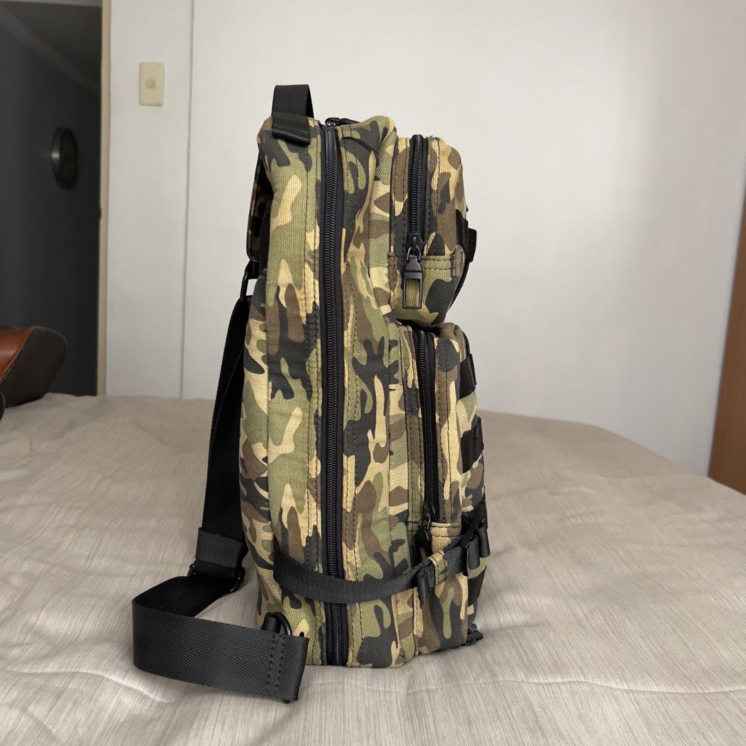 ZARA Camo Tactical Backpack with Multiple Compartments and Adjustable Straps (Category: Backpacks) located in Pasig City. Submitted by jenscloset86 (Listing ID 1465453553, Image 3). Description: Brand: ZARA • Rugged canvas material. • Two front zippered compartments. • Wearing on the zipper pocket (see photos). • Over all condition is excellent. • Clean interior and exterior, perfect for daily use, school, or outdoor trips. Measurement (in inches