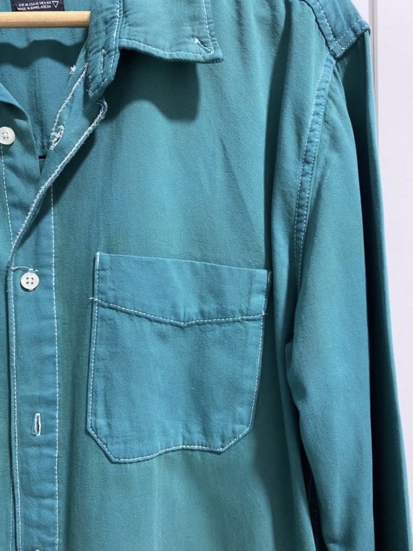 ZARA MAN Teal Overshirt XL (Category: Tshirts & Polo Shirts ) located in Quezon City. Submitted by wearhouze (Listing ID 1465484415, Image 2). Description: - Brand: Zara - Size: XL - Color: Teal with contrast white stitching - Details: Single chest pocket, relaxed fit - Condition: Clean, excellent pre-owned condition.