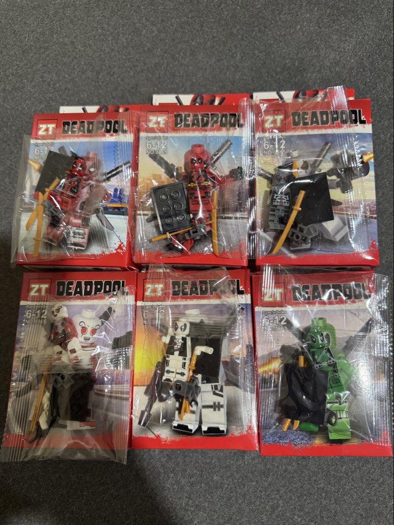 ZT Deadpool Blocks (Set of 6) (Category: Lego & Building Sets) located in Pasay City. Submitted by Bud09 (Listing ID 1460156590, Image 2). Description: - Set of 6 ZT Deadpool building block figures. - Each box has a unique Deadpool design. - Ideal for Deadpool fans and collectors. - Recommended for ages 6-12. - Collect the entire set!.