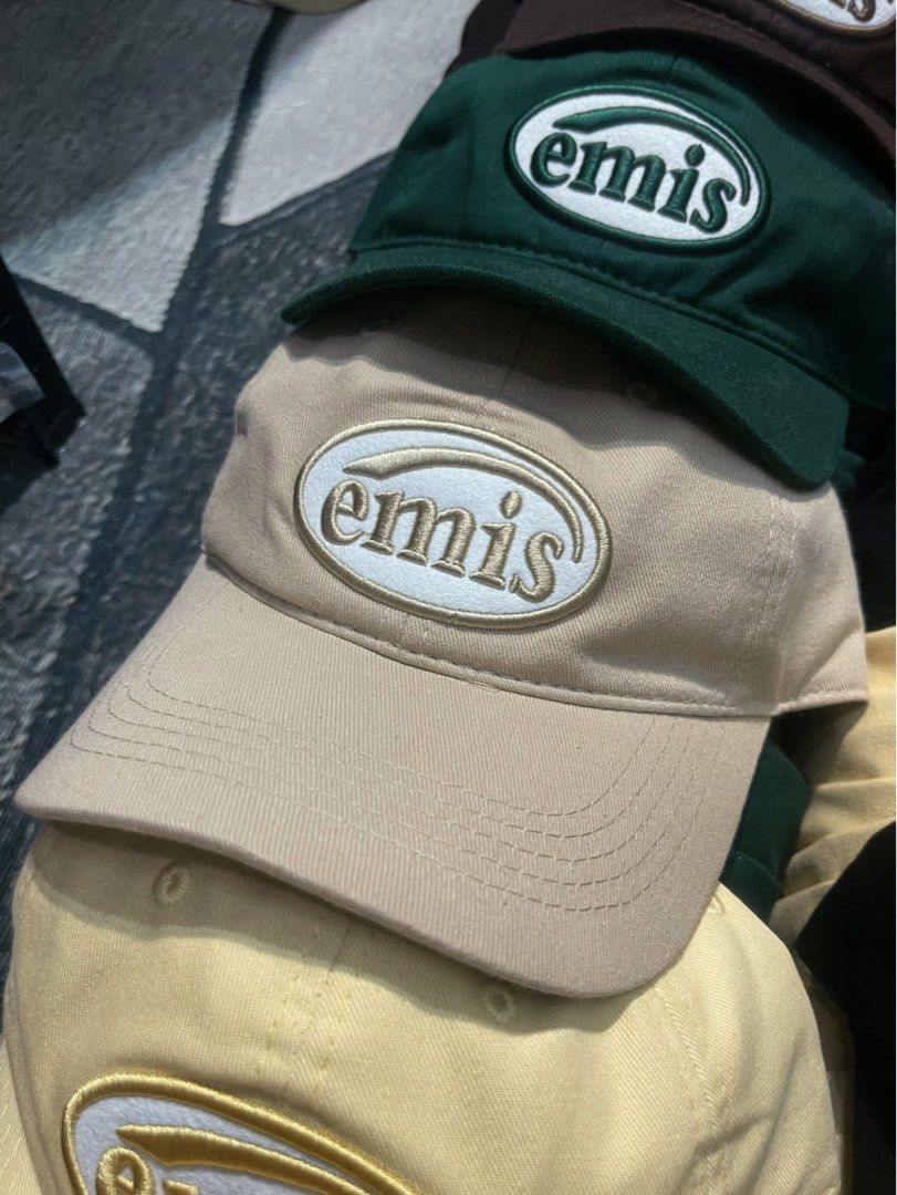 100% Authentic Emis Cap | Khaki Oval Logo Baseball Cap | Adjustable Fit (Category: Caps & Hats) located in Valenzuela. Submitted by oseancollective (Listing ID 1469205763, Image 1). Description: Keep your look clean and stylish with this khaki Emis cap featuring the signature oval Emis logo. Its earthy, neutral tone makes it easy to pair with casual outfits, everyday wear, and minimalist streetwear styles. Product Details: * Brand: Emis * Color: 