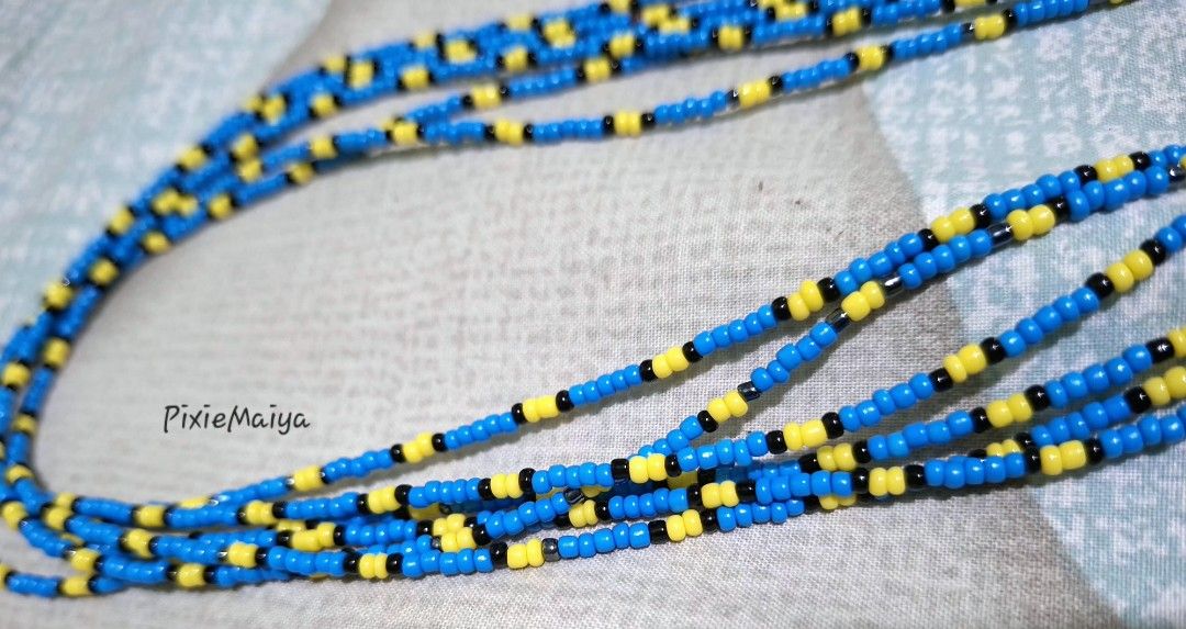 10 pcs Dory pattern Blue and yellow beaded necklace (Category: Necklaces) located in Valenzuela. Submitted by pixieworks64309 (Listing ID 1469382525, Image 1). Description: - Multistrand beaded necklace in blue, yellow, and black seed beads - Features cute light blue heart charms and carved floral beads - Long length design, slips right over the head easily - Handmade style with a vibrant color combination - Adds a great pop of color to everyday 