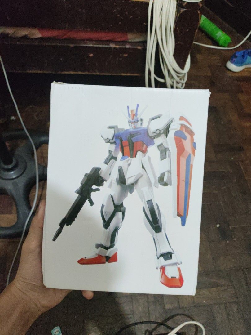 1/144 Mecha Model Kit with Shield & Rifle – Unassembled (Category: Gundam & Model Kits) located in Manila. Submitted by warmshark.1ae1ea (Listing ID 1469268350, Image 1). Description: Mecha model kit with a white, red, and blue color scheme. Unassembled model kit Includes parts for assembly Unofficial third-party model kit, not an original Bandai product Box may have minor imperfections Good for mecha fans and hobbyists looking for an affordable 