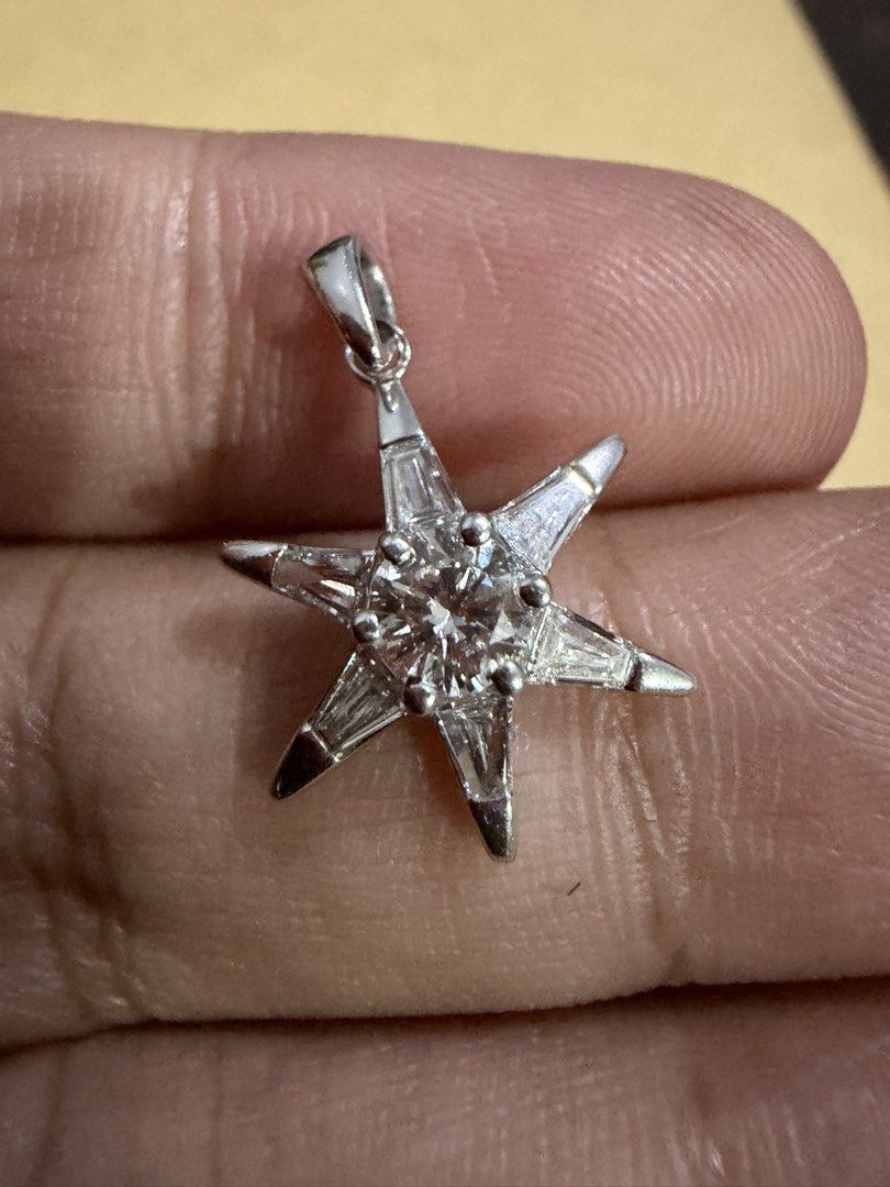 18K White Gold Star Diamond Pendant (Category: Charms) located in Las Pinas. Submitted by houseofgems0 (Listing ID 1469194922, Image 3). Description: Details: - 18K WG | 1.8g - Center Dia: .45ct - Total Dia: .94ct (natural, E-F, VVS-VS) - PRICE: ₱34,000Details: - 18K WG | 1.8g - Center Dia: .45ct - Total Dia: .94ct (natural, E-F, VVS-VS) - PRICE: ₱23,500 💎 All items are 100% AUTHENTIC/PAWNABLE. 💎 LAYAWAY AVAILABLE Send us a message to inquire. 