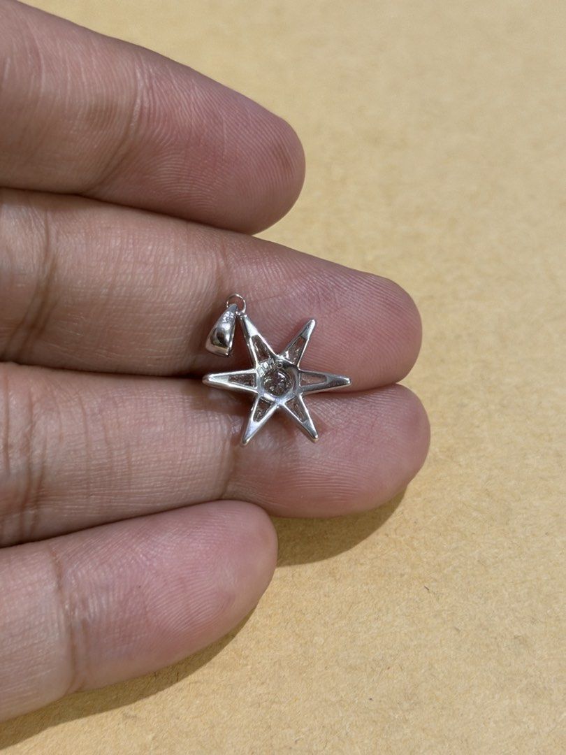 18K White Gold Star Diamond Pendant (Category: Charms) located in Las Pinas. Submitted by houseofgems0 (Listing ID 1469194922, Image 2). Description: Details: - 18K WG | 1.8g - Center Dia: .45ct - Total Dia: .94ct (natural, E-F, VVS-VS) - PRICE: ₱34,000Details: - 18K WG | 1.8g - Center Dia: .45ct - Total Dia: .94ct (natural, E-F, VVS-VS) - PRICE: ₱23,500 💎 All items are 100% AUTHENTIC/PAWNABLE. 💎 LAYAWAY AVAILABLE Send us a message to inquire. 