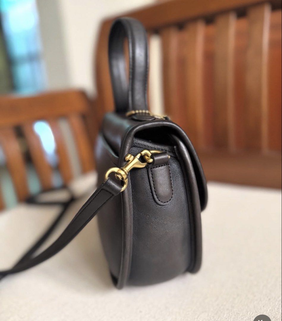 1995 Coach Bellacourt (Category: Luxury Bags & Wallets) located in Pasig City. Submitted by toutestbeau (Listing ID 1469180536, Image 3). Description: Vintage 1995 Coach Bellacourt - In navy blue but almost black - good condition/ not abused - Made in the USA - No inclusion, just the bag and authenticity card How to purchase: - tap offer button upon agreement with the seller (dont offer unless decided) - Payment first before shipping - First to p