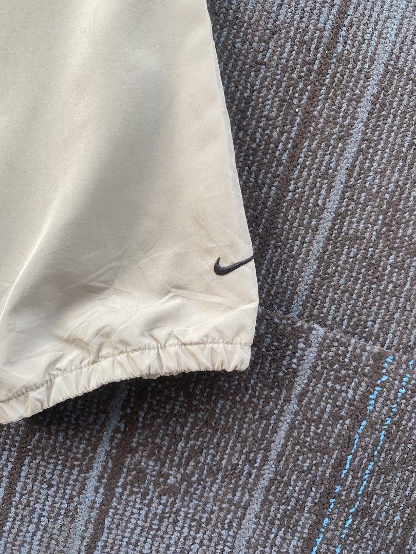 2000s Two Tone Nike Active Rain Jacket (Category: Coats, Jackets and Outerwear) located in Taguig. Submitted by offther4ck (Listing ID 1469165902, Image 2). Description: - Size M(8-10) - Issue: Minimal ( Provided in the pictures ) - Zippers are working smoothly - Complete tags - Width: 22 inches - Length: 28 inches.