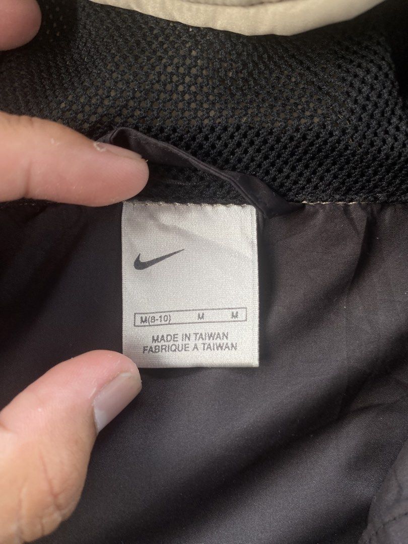 2000s Two Tone Nike Active Rain Jacket (Category: Coats, Jackets and Outerwear) located in Taguig. Submitted by offther4ck (Listing ID 1469165902, Image 3). Description: - Size M(8-10) - Issue: Minimal ( Provided in the pictures ) - Zippers are working smoothly - Complete tags - Width: 22 inches - Length: 28 inches.