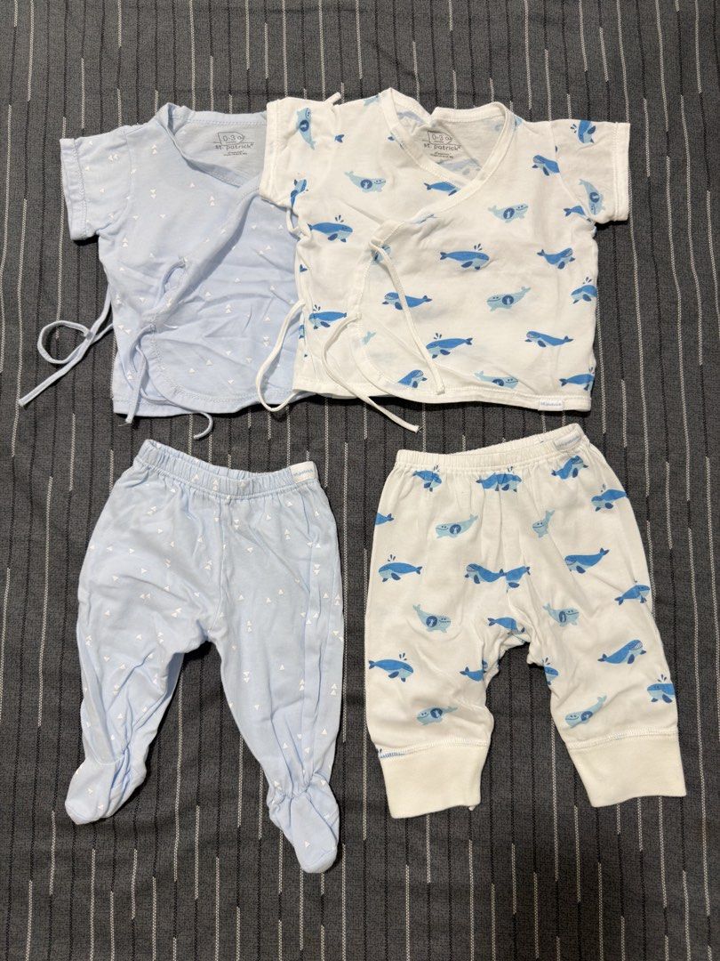 2 Pairs of St. Patrick Newborn Terno (Category: Babies & Kids Fashion) located in Caloocan City. Submitted by labellecollection (Listing ID 1469338052, Image 1). Description: - Brand: St. Patrick - Size: 0-3 months (Newborn) - Quantity: 2 complete outfits - Design 1: Solid light blue with tiny white triangles - Design 2: Playful blue whale print on white fabric - Features: Matching side-tie wrap tops and footed bottoms to keep tiny toes warm - Ma