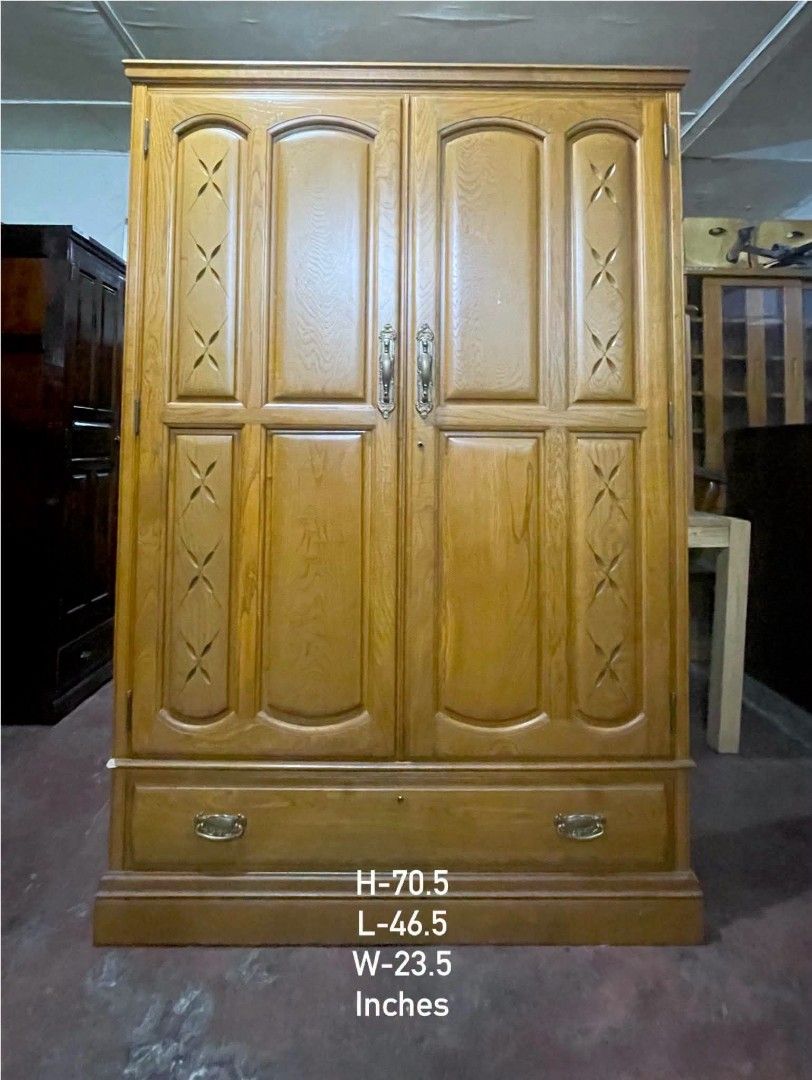 2-Door Wardrobe Cabinet with Bottom Drawer (Category: Shelves, Cabinets & Racks) located in Quezon City. Submitted by dannikkishoppe2 (Listing ID 1469203757, Image 2). Description: 2-Door Wardrobe Cabinet with Bottom Drawer ‼️₱14000‼️ ✔️ Sturdy wooden construction ✔️ Elegant classic design ✔️ Spacious storage for your clothes and essentials ✔️ With bottom drawer for extra storage 📏 Dimensions: Height: 70.5" Length: 46.5" Width: 23.5" 🏡 Perfect 