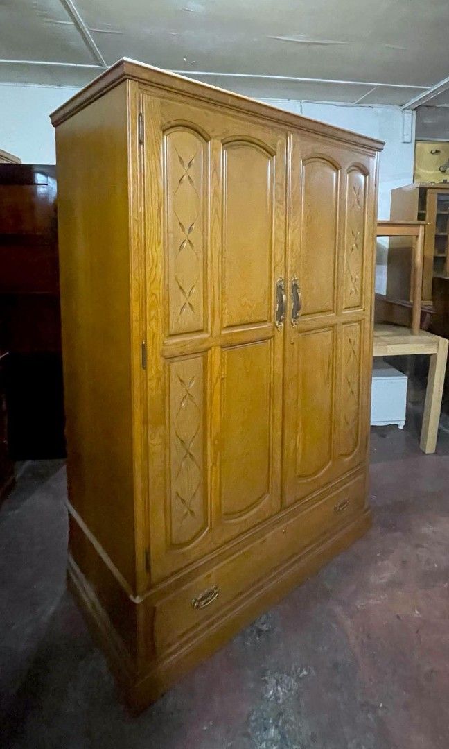 2-Door Wardrobe Cabinet with Bottom Drawer (Category: Shelves, Cabinets & Racks) located in Quezon City. Submitted by dannikkishoppe2 (Listing ID 1469203757, Image 3). Description: 2-Door Wardrobe Cabinet with Bottom Drawer ‼️₱14000‼️ ✔️ Sturdy wooden construction ✔️ Elegant classic design ✔️ Spacious storage for your clothes and essentials ✔️ With bottom drawer for extra storage 📏 Dimensions: Height: 70.5" Length: 46.5" Width: 23.5" 🏡 Perfect 
