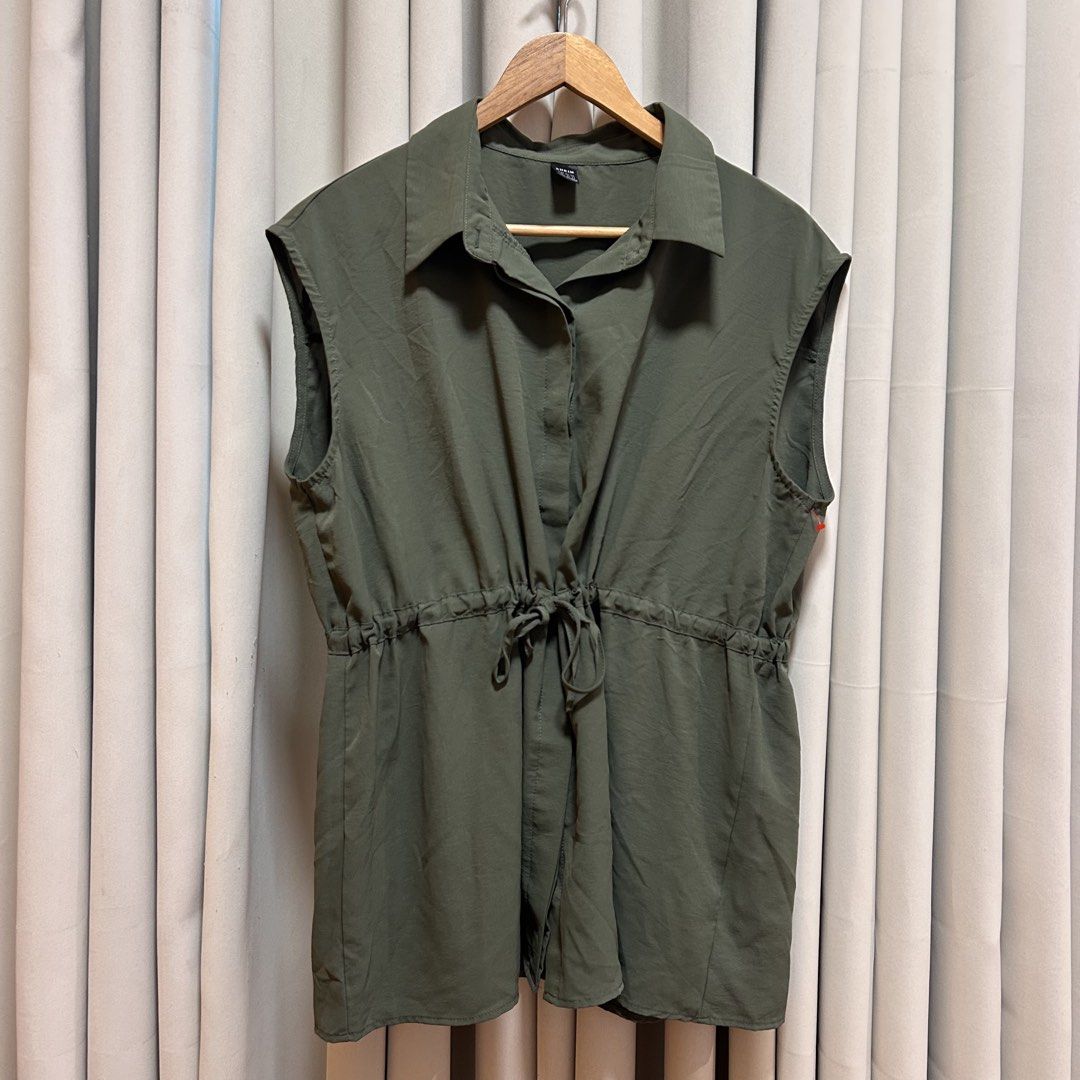 2XL Shein Green Sleeveless Drawstring Top (Category: Sleeveless) located in Rizal. Submitted by from99abovecloset (Listing ID 1469162402, Image 1). Description: CODE:190 Size: 2XL Armhole (laid flat):10” Bust (around): 52” Length (laid flat): 29” Soft poly | loose | like new.