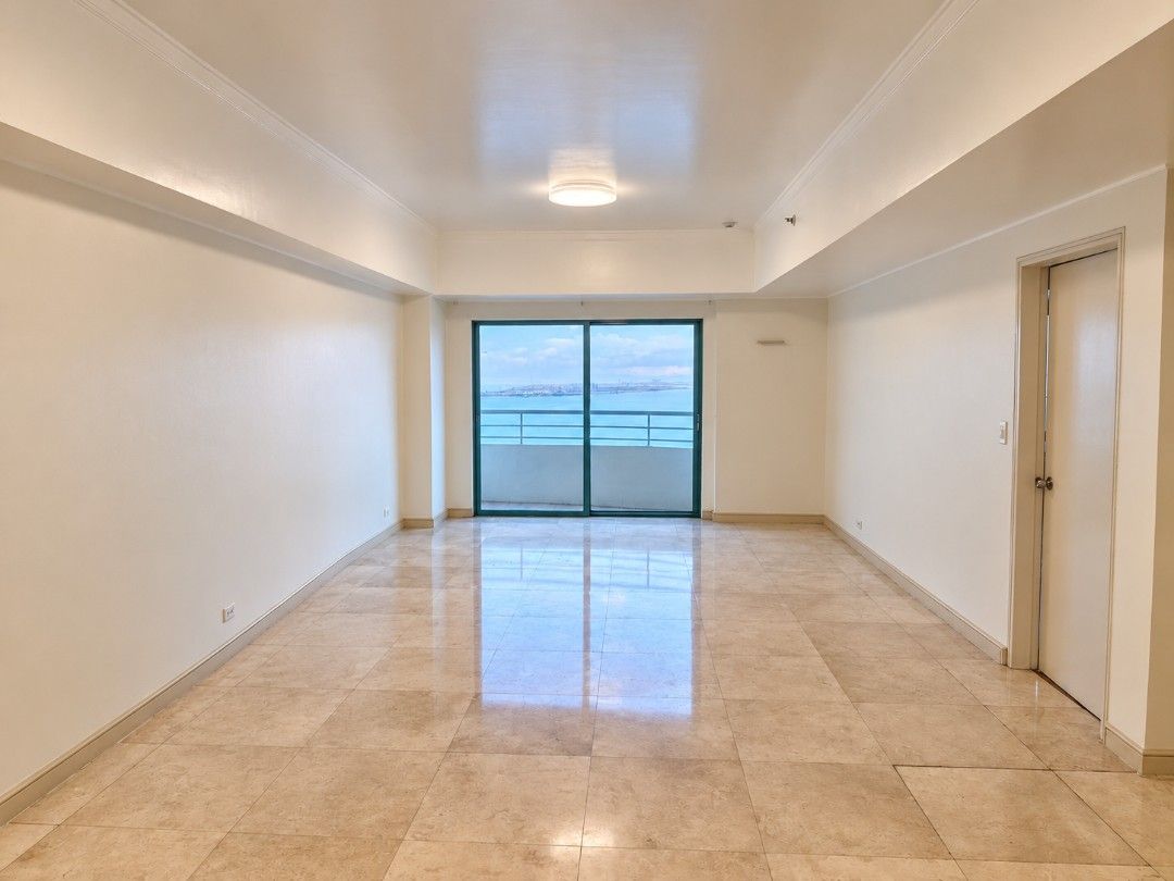 3BR Ocean Tower Condo - Manila Bay View (Category: Apartments & Condos) located in Paranaque City. Submitted by surfandfitness (Listing ID 1331806517, Image 2). Description: 🌅 For Sale: Luxury 3BR Bayfront Condo w/ Panoramic Sunset View – Ocean Tower, Roxas Blvd 📍 Ocean Tower Condominium, Roxas Boulevard – Manila Baywalk 📐 178 sqm corner unit 🏢 24th Floor (Penthouse above) 🛏 3 Bedrooms + Maid’s Room 🛁 3 Bathrooms 🚗 1 Basement Parking 💡 Ba