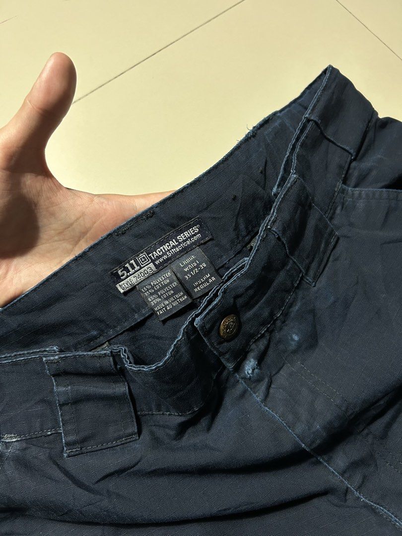 5.11 Tactical Series Cargo Pants Navy Size Large (Category: Trousers) located in Quezon City. Submitted by commonwealthpickerph (Listing ID 1469282899, Image 3). Description: 5.11 Tactical Series Navy blue cargo pants 38 waist 42 length 31.5 inseam 8.5 opening - in used condition - Has sign of used - 9/10 color rate - Issue: check pic to see details - Style: 74003 Cargo Pants - Color: Dark Navy Blue - Size: Large (Waist: 35.5" to 39", Regular Ins