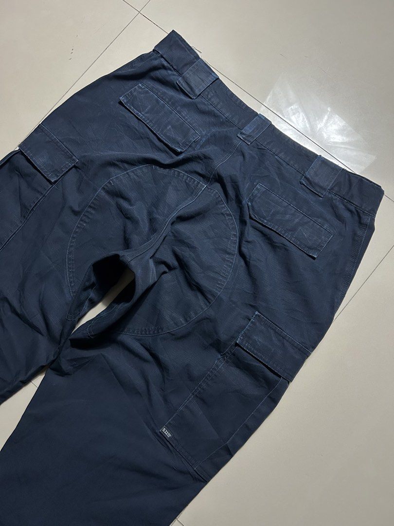 5.11 Tactical Series Navy Blue Cargo Pants (Category: Trousers) located in Quezon City. Submitted by commonwealthpickerph (Listing ID 1469283162, Image 2). Description: 5.11 Tactical Series Navy blue cargo pants 38 waist 42 length 31.5 inseam 8.5 opening - in used condition - Has sign of used - 9/10 color rate - Issue: check pic to see details - Style: 74003 Cargo Pants - Color: Dark Navy Blue - Size: Large (Waist: 35.5” to 39”, Regular Inseam) -