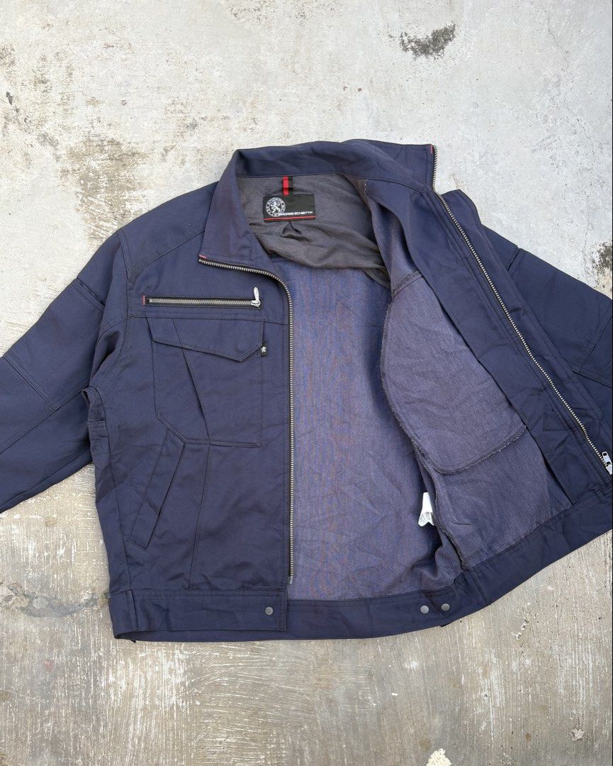 A4071 Navy Blue Workwear Jacket (Category: Coats, Jackets and Outerwear) located in Calamba. Submitted by lyrons.wardrobe (Listing ID 1469254775, Image 2). Description: Dimes: 22.5x23 * Brand: Andare Schietti (by Co-Cos) * Model Code: A4071 (Spring/Summer Long-Sleeve Blouson) * Color: Navy / Blue variant * Features: Front zipper closure, zippered chest pocket, standard button-flap pockets, and a mesh-lined collar construction..