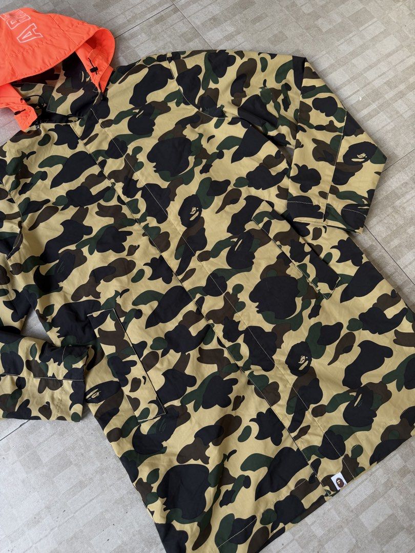 A Bathing Ape BAPE 1st Camo Long Mod Coat/Trench Jacket (Category: Coats, Jackets and Outerwear) located in Cavite. Submitted by PRIVATE.Selection (Listing ID 1469192828, Image 3). Description: A Bathing Ape BAPE 1st Camo Long Mod Coat/Trench Jacket Detachable Hood Size Large W- 23 L- 38 Good as new Condition .