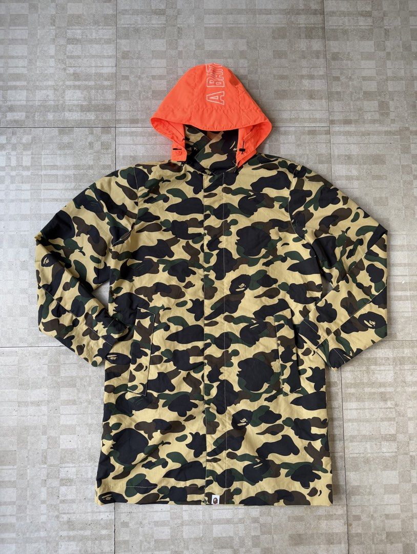 A Bathing Ape BAPE 1st Camo Long Mod Coat/Trench Jacket (Category: Coats, Jackets and Outerwear) located in Cavite. Submitted by PRIVATE.Selection (Listing ID 1469192828, Image 1). Description: A Bathing Ape BAPE 1st Camo Long Mod Coat/Trench Jacket Detachable Hood Size Large W- 23 L- 38 Good as new Condition .