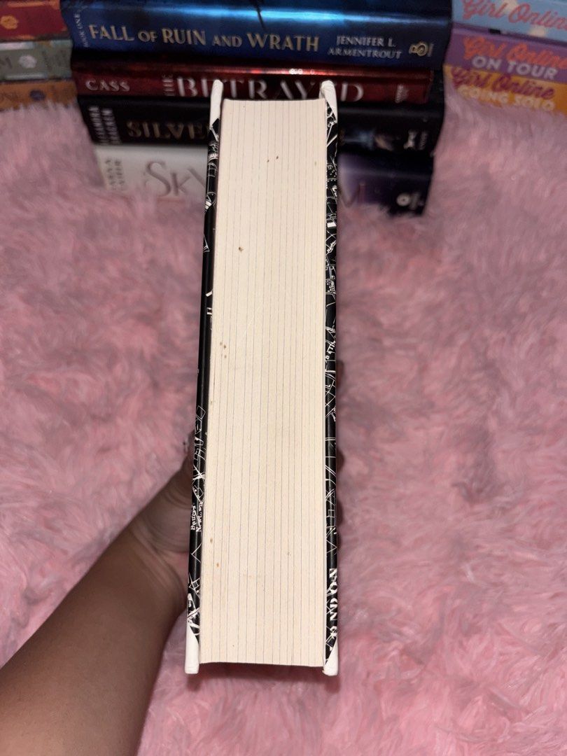 A Conjuring of Light V.E. Schwab Novel (Category: Storybooks) located in Batangas. Submitted by solunarareads (Listing ID 1469202768, Image 2). Description: - Title: A Conjuring of Light by V.E. Schwab - Edition: Hardcover with custom sprayed/patterned edges - Series: Shades of Magic (Book 3) - Condition: Cover intact, clean pages overall, minor spotting on some edges - Genre: Fantasy, urban fantasy, and young adult fiction 📍Batangas City 🚚 TCO