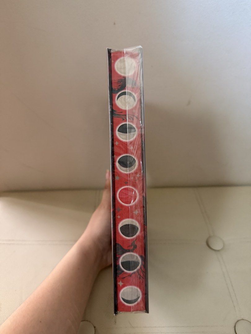 A Monsoon Rising by Thea Guanzon (Category: Storybooks) located in Zamboanga. Submitted by nini_0423 (Listing ID 1468878131, Image 2). Description: - Title: The Hurricane Wars by Thea Guanzon (or bestselling fantasy novel) - Publisher: HarperVoyager - Format: Hardcover with stunning sprayed edges (red & black moon phases) - Condition: Brand new, still sealed in original plastic shrink wrap - Author: New York Times bestselling author - Perfect for