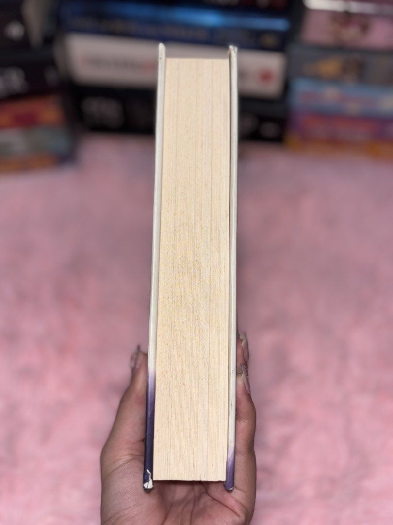 A Sky Beyond the Storm by Sabaa Tahir (Category: Storybooks) located in Batangas. Submitted by solunarareads (Listing ID 1469202772, Image 2). Description: - Title: A Sky Beyond the Storm by Sabaa Tahir - Series: Book 3 of An Ember in the Ashes quartet - Format: Hardcover with dust jacket - Condition: Minor shelf wear on dust jacket edges; yellowing and spotting on page edges - Note: Red remainder dot stamped on the bottom page block - Perfect fo