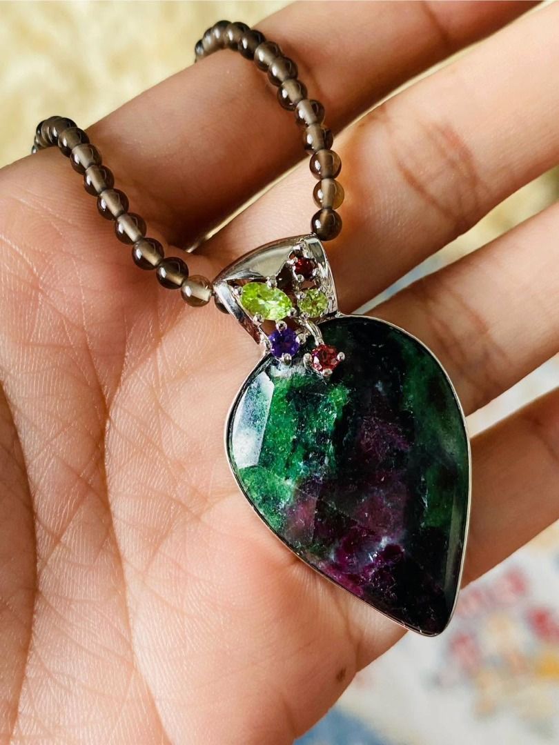 A Statement in Gemstones | Ruby Zoisite & Smoky Quartz Silver Necklace (Category: Necklaces) located in Baguio. Submitted by asna_taku (Listing ID 1469254223, Image 2). Description: 🖤 A Statement in Gemstones | Ruby Zoisite & Smoky Quartz Silver Necklace 💚 Earthy elegance meets bold color. ✨ This striking necklace pairs a captivating ruby zoisite pendant, showcasing rich green and deep burgundy hues, with the warm, smoky glow of 3mm quartz bead