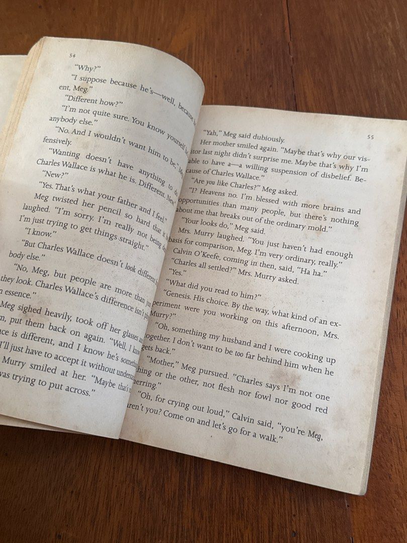 A Wrinkle in Time by Madeleine L'Engle (Category: Storybooks) located in Santo Tomas. Submitted by toughu (Listing ID 1469223111, Image 3). Description: - Title & Author: A Wrinkle in Time by Madeleine L'Engle - Publisher: Square Fish (Paperback) - Genre: Classic Children's Fantasy / Space-Time Travel - Condition: Heavily used, tanning and foxing on pages, taped cover protector, handwritten name on the inside - Readability: All pages are fully in