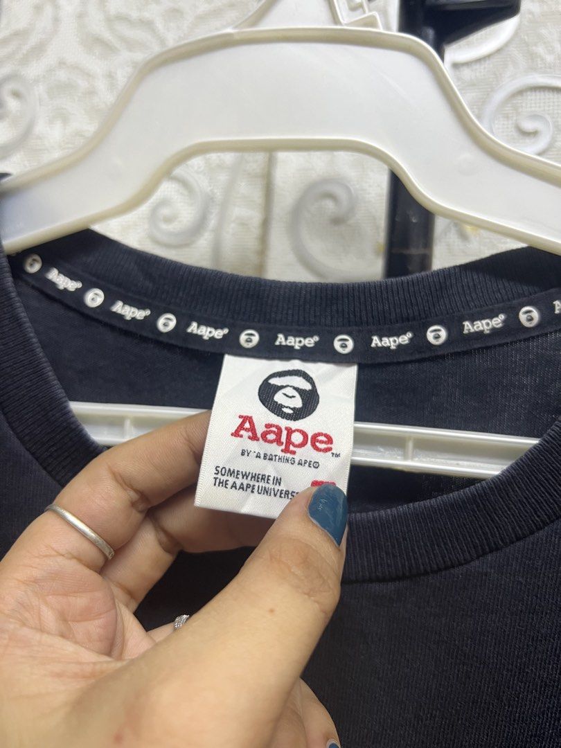 Aape By A Bathing Ape Black Camo Tee (Category: Luxury Apparel) located in Manila. Submitted by irenekaren57943 (Listing ID 1469172568, Image 3). Description: 𒊹︎ AAPE By A Bathing Ape Camo Ape Head Black Tee ➤ 𝟐𝟎 𝐖 | 𝟐𝟕 𝐋 (𝐌𝐞𝐝𝐢𝐮𝐦) ➤ 𝟗.𝟓 | 𝐄𝐱𝐜𝐞𝐥𝐥𝐞𝐧𝐭 ➤ 𝐍𝐨 𝐈𝐬𝐬𝐮𝐞 .