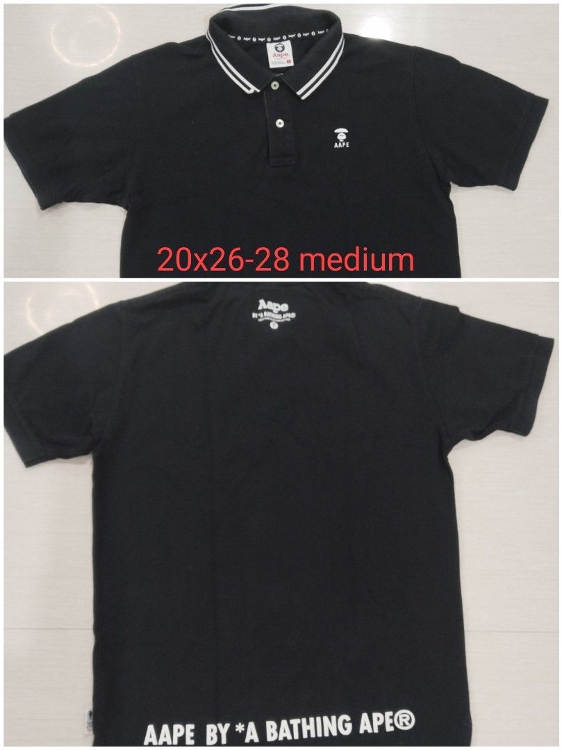 Aape By A Bathing Ape Black Polo Shirt Medium (Category: Tshirts & Polo Shirts ) located in Manila. Submitted by polding25 (Listing ID 1469169426, Image 1). Description: - Brand: Aape by A Bathing Ape - Item: Black Polo Shirt - Size: Medium (Measures ~20" chest, 26-28" length) - Details: White ape head logo on chest, striped collar trim - Back Design: Large white printed lettering near the hem - Condition: Excellent, 100% authentic streetwear.