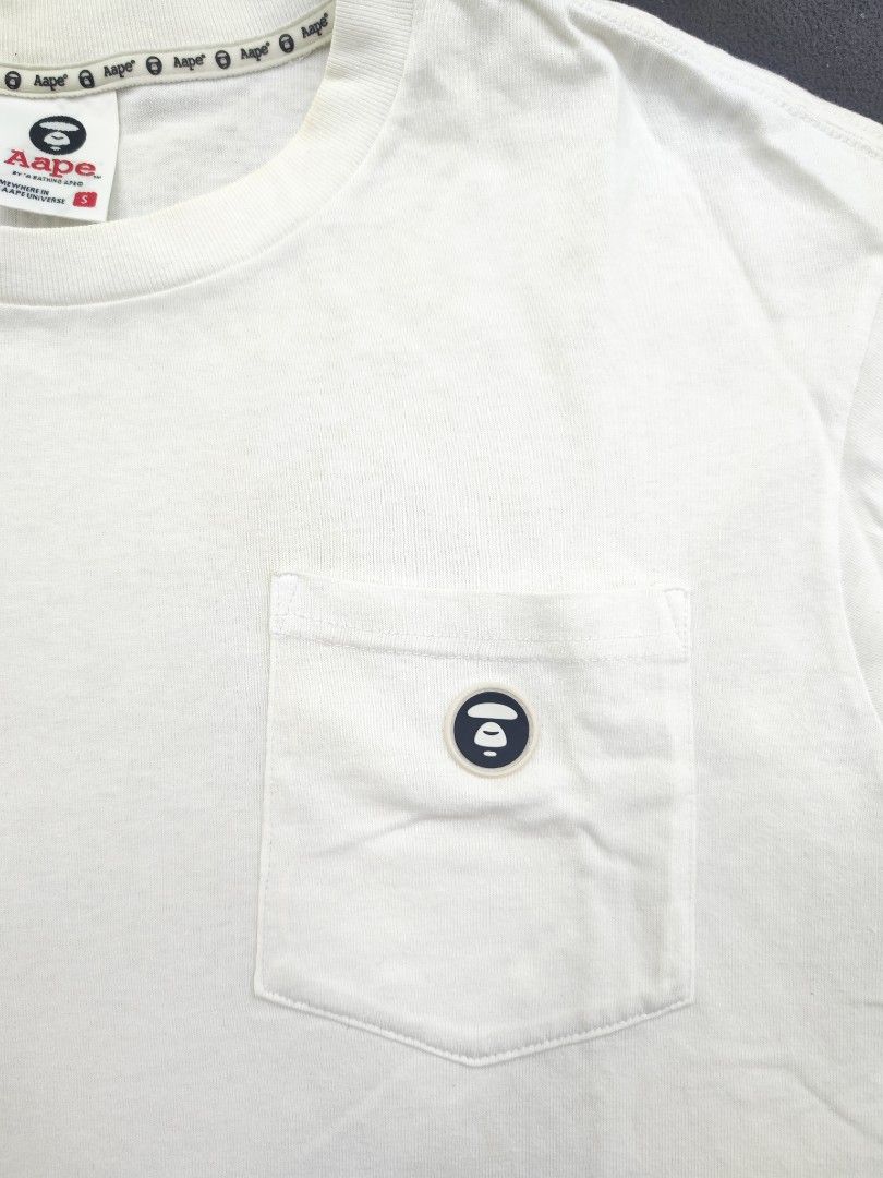 Aape Pocket Tee (Category: Tshirts & Polo Shirts ) located in Bulacan. Submitted by emilj23 (Listing ID 1469196678, Image 2). Description: Aape Pocket Tee Size S on tag L 25 W 20 Condition 9/10 Color rate 9/10 Issue Yellow Stains.