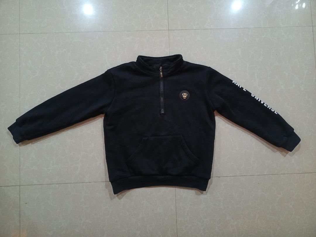 Aape Universe Black Quarter Zip Sweatshirt (Category: Coats, Jackets and Outerwear) located in Cabatuan. Submitted by penthegreat (Listing ID 1469163580, Image 1). Description: Off lang, for PSG only 17.5 or 18 width & 19.5 or 20 length - Brand: Aape Universe - Color: Black - Style: Quarter-zip sweatshirt with high collar and kangaroo pocket - Details: Ape logo badge on chest, "AAPE UNIVERSE" printed down the left sleeve - Comfort: Thick fleece l