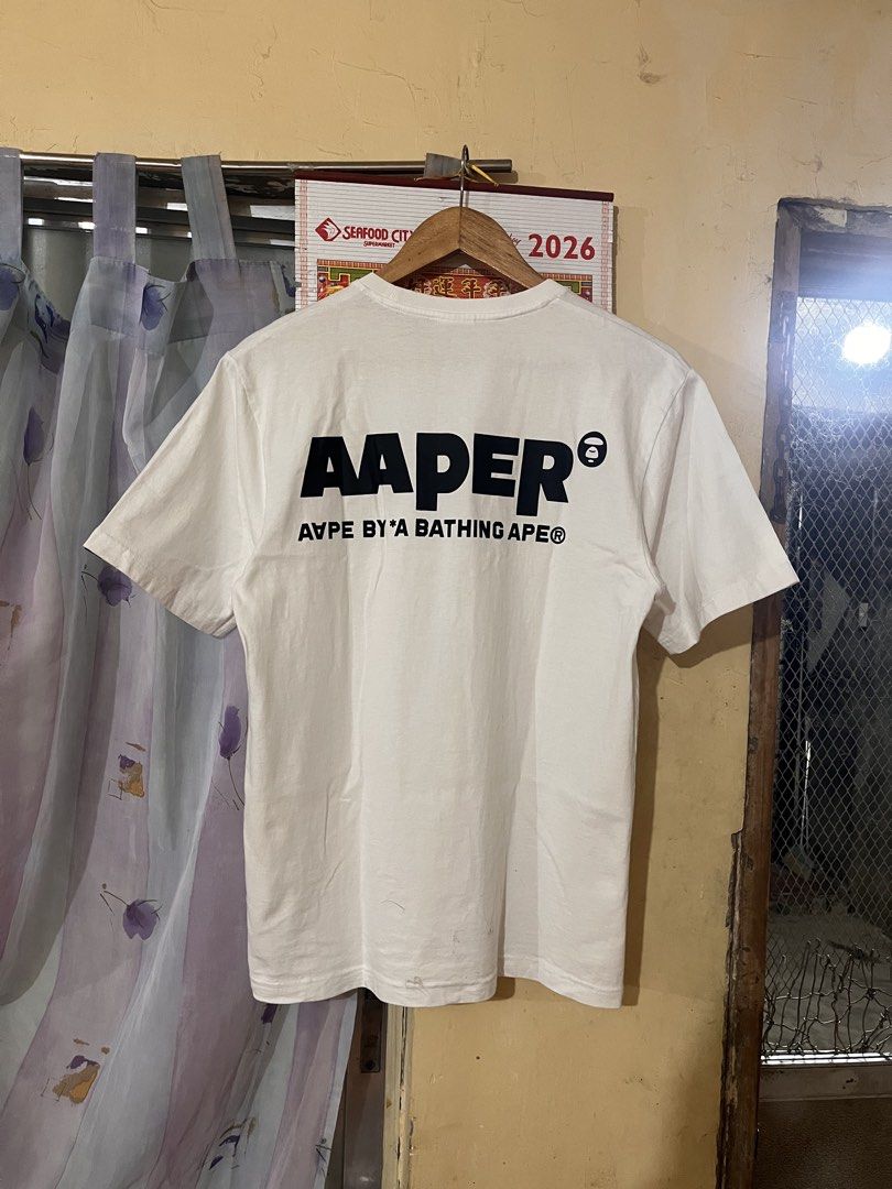 AAPE WHITE SHIRT (Category: Tshirts & Polo Shirts ) located in Talisay. Submitted by arabell21 (Listing ID 1469341895, Image 1). Description: Good as new condition Size Small on tag Dimes W19 L27-28 Color rate 10/10 No issue .