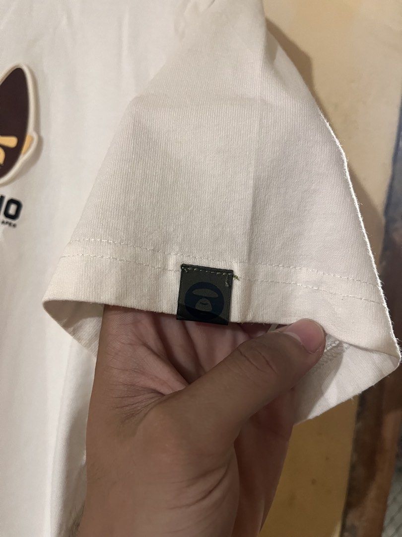 AAPE WHITE SHIRT (Category: Tshirts & Polo Shirts ) located in Talisay. Submitted by arabell21 (Listing ID 1469341895, Image 3). Description: Good as new condition Size Small on tag Dimes W19 L27-28 Color rate 10/10 No issue .