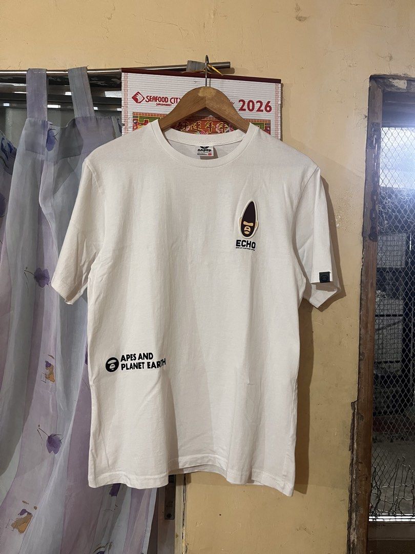 AAPE WHITE SHIRT (Category: Tshirts & Polo Shirts ) located in Talisay. Submitted by arabell21 (Listing ID 1469341895, Image 2). Description: Good as new condition Size Small on tag Dimes W19 L27-28 Color rate 10/10 No issue .